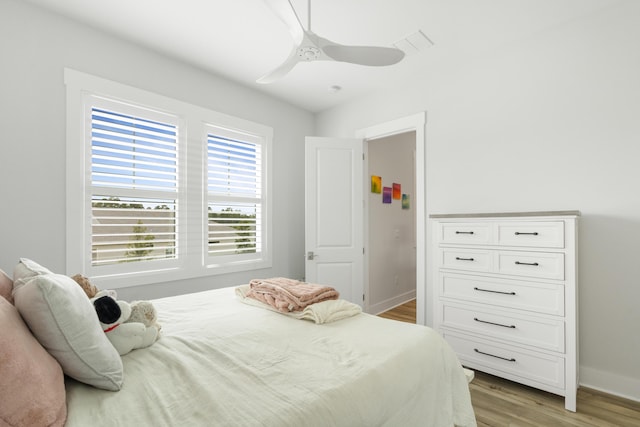 276 W Lafayette Rd, Inlet Beach, FL 32461 - bedroom with light wood finished floors, baseboards, and a ceiling fan