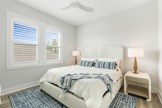 276 W Lafayette Rd, Inlet Beach, FL 32461 - bedroom featuring wood finished floors, baseboards, and a ceiling fan