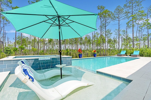 276 W Lafayette Rd, Inlet Beach, FL 32461 - view of swimming pool featuring a patio, a jacuzzi, and view of scattered trees