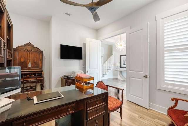 276 W Lafayette Rd, Inlet Beach, FL 32461 - home office featuring a ceiling fan, light wood-style floors, a chandelier, and baseboards
