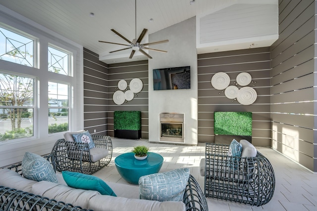 276 W Lafayette Rd, Inlet Beach, FL 32461 - living room with a ceiling fan, vaulted ceiling, and a fireplace