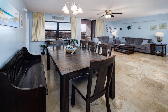 660 Nautilus Ct Unit 1103, Fort Walton Beach, FL 32548 - dining space featuring a ceiling fan and a chandelier