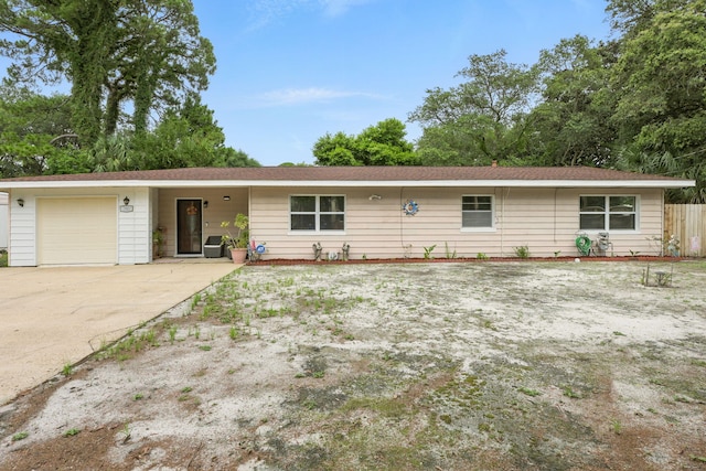 101 SE Elm Ave, Fort Walton Beach, FL 32548 - ranch-style house with a garage and concrete driveway