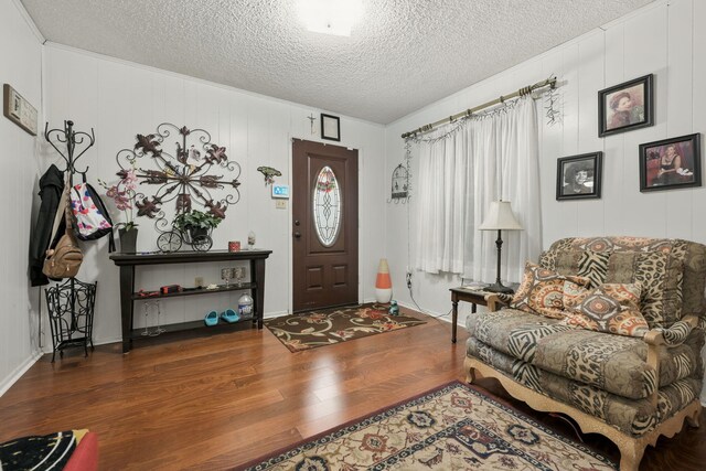 101 SE Elm Ave, Fort Walton Beach, FL 32548 - foyer entrance with wood finished floors and a textured ceiling