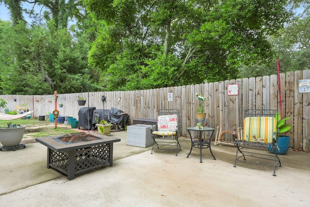 101 SE Elm Ave, Fort Walton Beach, FL 32548 - fenced backyard featuring an outdoor fire pit and a patio