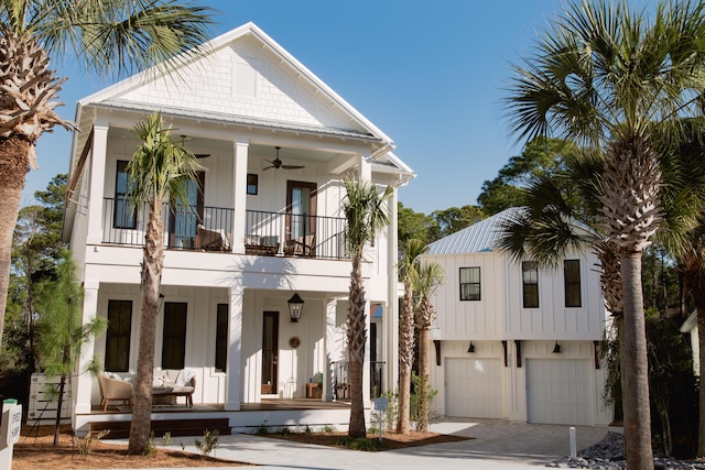250 Beach Bike Way, Inlet Beach, FL 32461 - view of front of house with a porch, a balcony, a garage, ceiling fan, and driveway