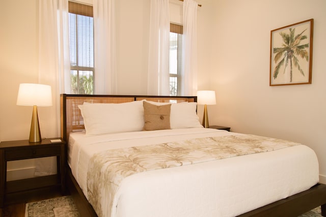 250 Beach Bike Way, Inlet Beach, FL 32461 - bedroom with multiple windows and wood finished floors