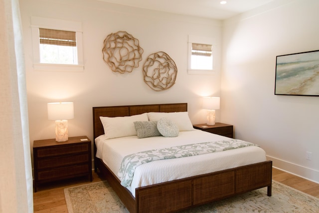 250 Beach Bike Way, Inlet Beach, FL 32461 - bedroom featuring wood finished floors, multiple windows, baseboards, and recessed lighting