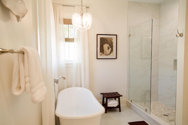 250 Beach Bike Way, Inlet Beach, FL 32461 - full bath featuring a soaking tub, a chandelier, a marble finish shower, marble look tile flooring, and baseboards