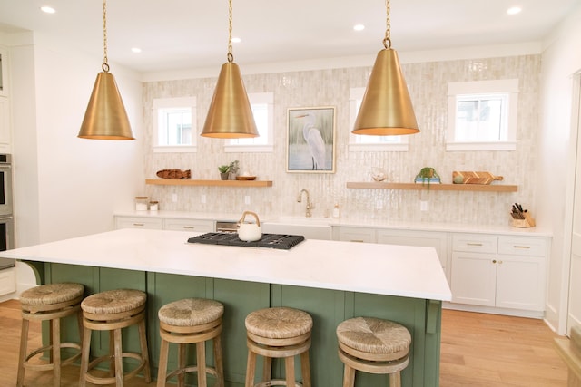 250 Beach Bike Way, Inlet Beach, FL 32461 - kitchen featuring a sink, white cabinets, tasteful backsplash, and recessed lighting