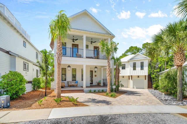 250 Beach Bike Way, Inlet Beach, FL 32461 - view of front of house featuring covered porch, ceiling fan, a balcony, an attached garage, and decorative driveway