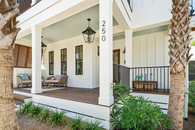 250 Beach Bike Way, Inlet Beach, FL 32461 - entrance to property with board and batten siding and a porch