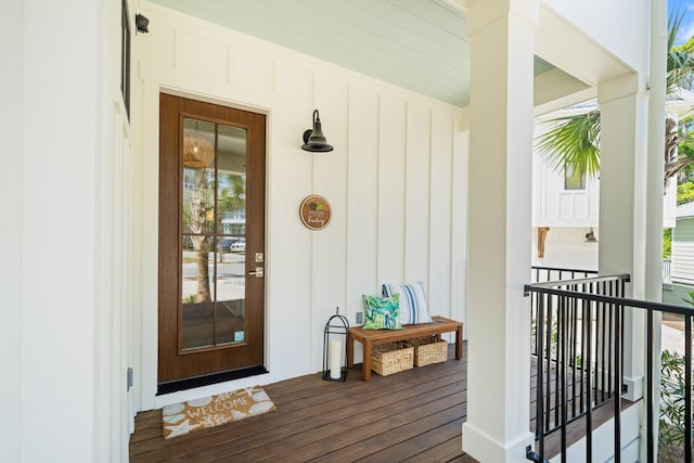 250 Beach Bike Way, Inlet Beach, FL 32461 - view of exterior entry with board and batten siding and a porch