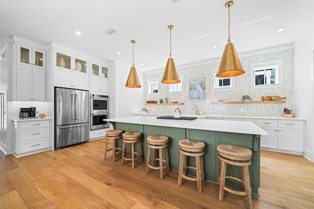 250 Beach Bike Way, Inlet Beach, FL 32461 - kitchen featuring stainless steel appliances, tasteful backsplash, light countertops, a kitchen island, and recessed lighting