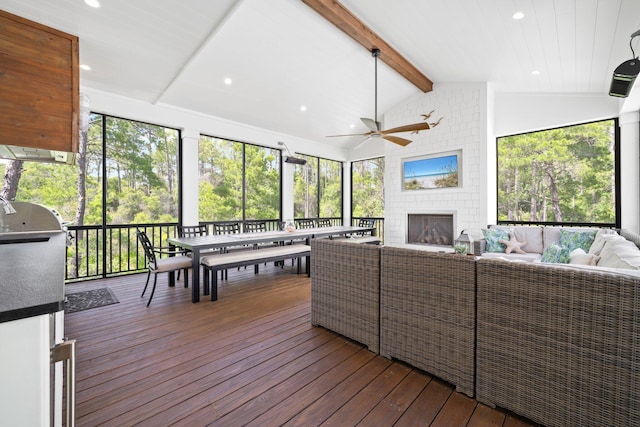 250 Beach Bike Way, Inlet Beach, FL 32461 - sunroom featuring an outdoor living space with a fireplace, outdoor dining area, and a ceiling fan