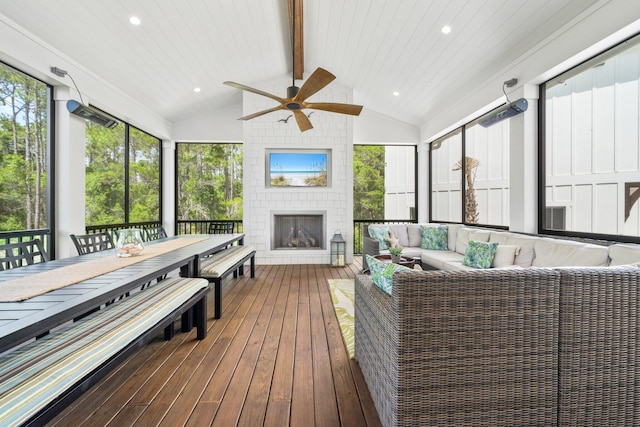 250 Beach Bike Way, Inlet Beach, FL 32461 - sunroom / solarium featuring an outdoor living space with a fireplace, a ceiling fan, and outdoor dining space