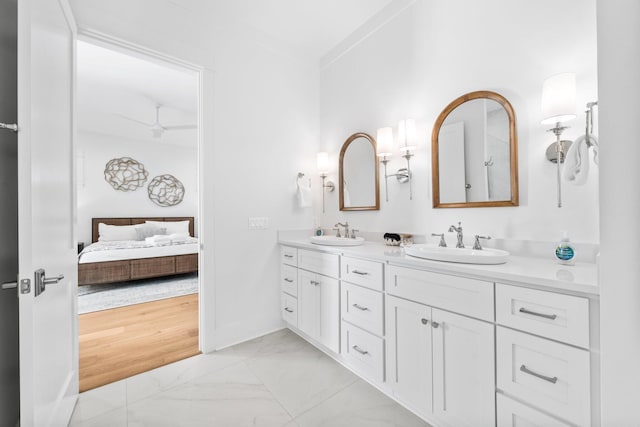 250 Beach Bike Way, Inlet Beach, FL 32461 - ensuite bathroom featuring double vanity and marble finish flooring