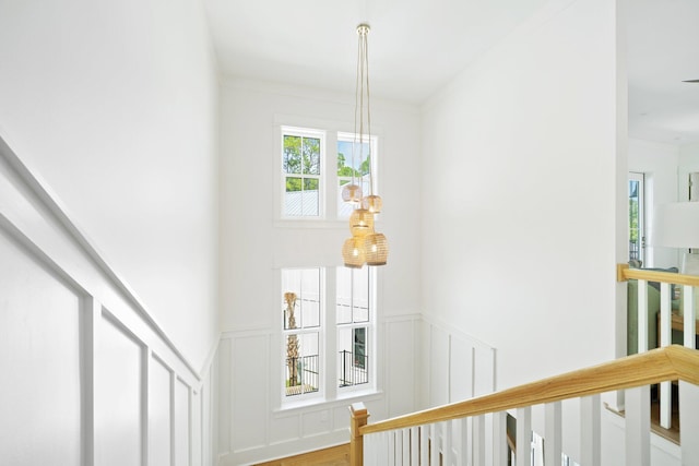 250 Beach Bike Way, Inlet Beach, FL 32461 - stairway featuring a decorative wall, a wainscoted wall, and wood finished floors