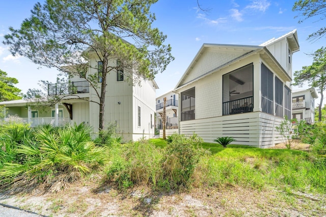 250 Beach Bike Way, Inlet Beach, FL 32461 - view of home's exterior with a sunroom