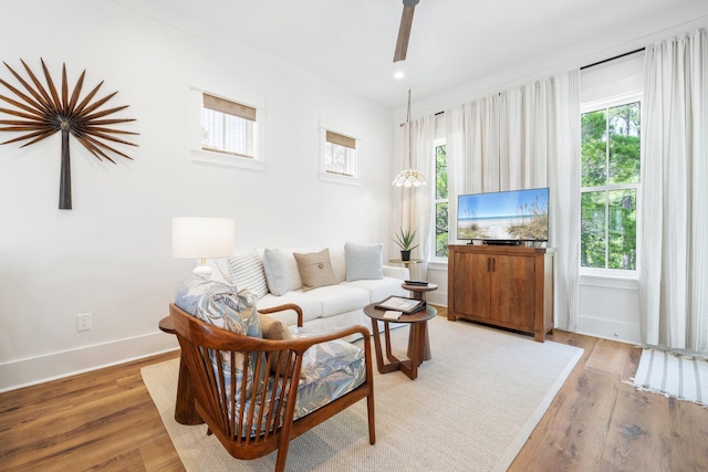 250 Beach Bike Way, Inlet Beach, FL 32461 - living area with light wood-style flooring, baseboards, and ceiling fan