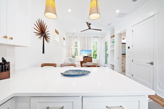 250 Beach Bike Way, Inlet Beach, FL 32461 - kitchen featuring white cabinetry, open floor plan, recessed lighting, and a peninsula
