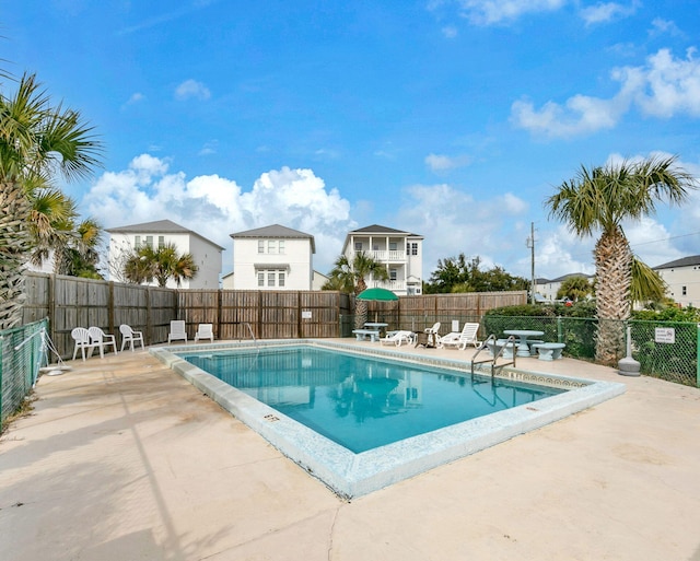 107 Surf Song Ln Unit A1, Miramar Beach, FL 32550 - community pool with a patio