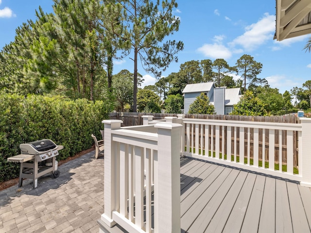 14 Bayshore Pines Ct, Miramar Beach, FL 32550 - wooden terrace featuring a fenced backyard, a patio area, and grilling area