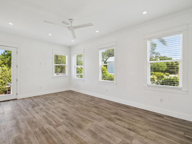 14 Bayshore Pines Ct, Miramar Beach, FL 32550 - unfurnished room with a ceiling fan, wood finished floors, baseboards, and recessed lighting