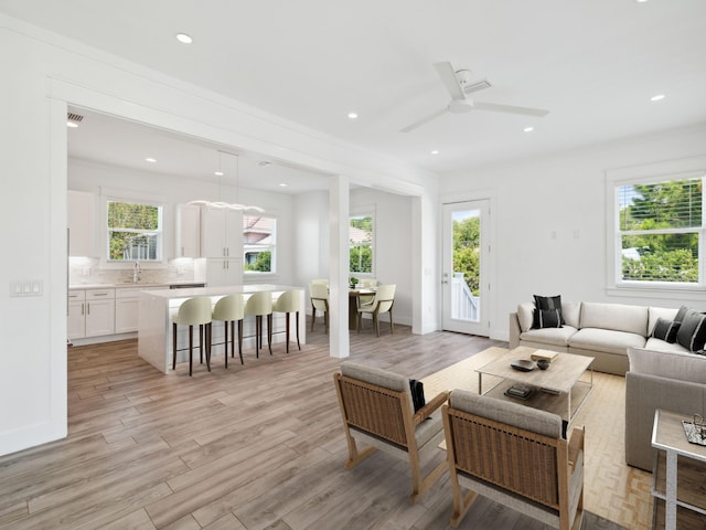 14 Bayshore Pines Ct, Miramar Beach, FL 32550 - living room featuring light wood-style floors, plenty of natural light, ceiling fan, recessed lighting, and baseboards