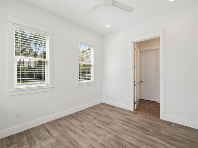 14 Bayshore Pines Ct, Miramar Beach, FL 32550 - empty room featuring ceiling fan, baseboards, wood finished floors, ornamental molding, and recessed lighting