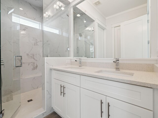 14 Bayshore Pines Ct, Miramar Beach, FL 32550 - bathroom featuring a marble finish shower, double vanity, and ornamental molding