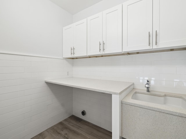 14 Bayshore Pines Ct, Miramar Beach, FL 32550 - laundry room with tile walls, dark wood finished floors, and a sink