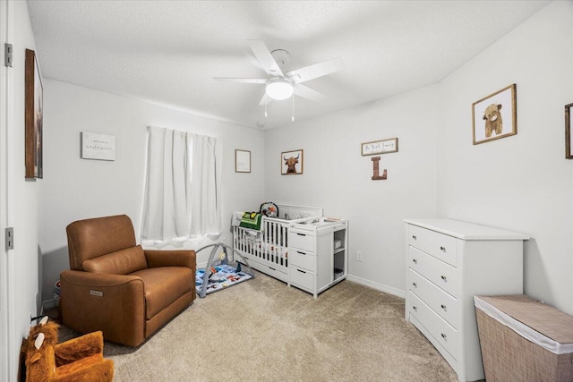 7319 Gordon Evans Rd, Navarre, FL 32566 - bedroom featuring carpet flooring, a crib, and ceiling fan