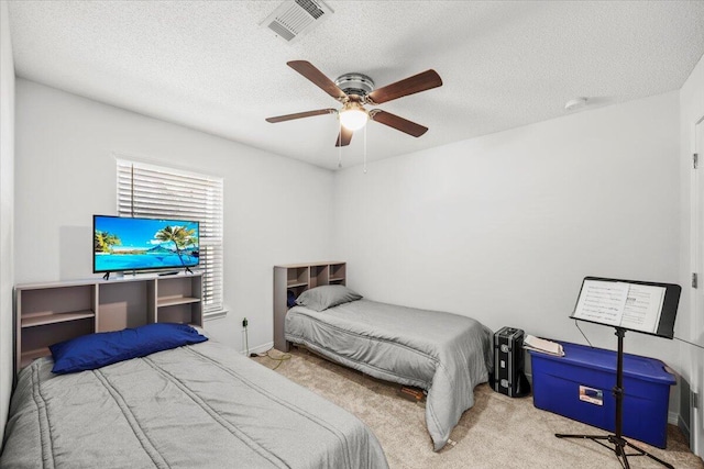 7319 Gordon Evans Rd, Navarre, FL 32566 - carpeted bedroom featuring a textured ceiling and a ceiling fan
