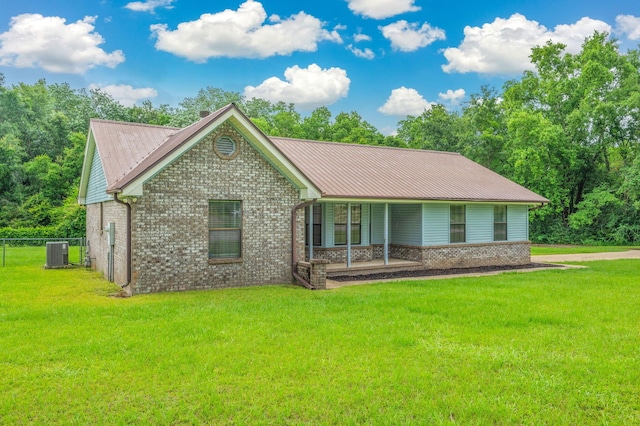 5903 Jack Stokes Rd, Baker, FL 32531 - ranch-style house with brick siding and a metal roof
