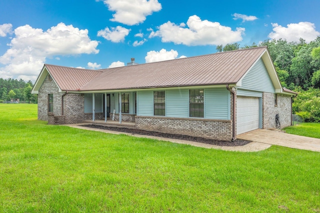 5903 Jack Stokes Rd, Baker, FL 32531 - ranch-style house with brick siding, a garage, concrete driveway, and a front yard