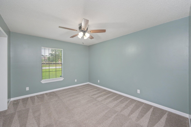 5903 Jack Stokes Rd, Baker, FL 32531 - carpeted spare room with ceiling fan and a textured ceiling