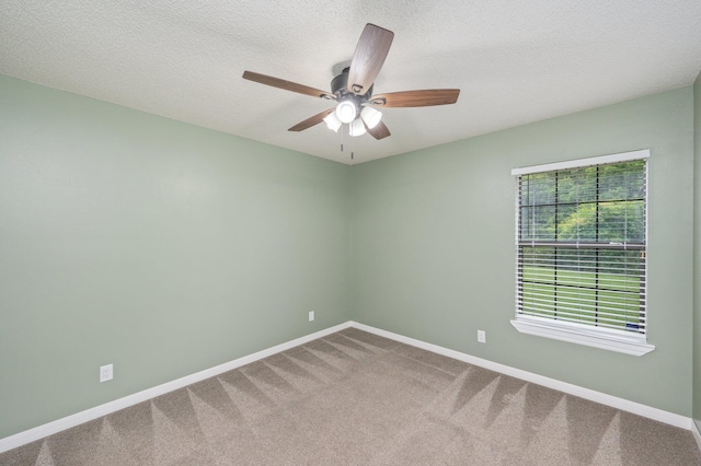 5903 Jack Stokes Rd, Baker, FL 32531 - unfurnished room featuring a ceiling fan, carpet, and a textured ceiling