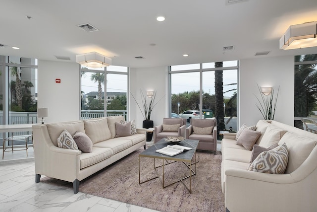 3820 E County Highway 30a Unit 408, Santa Rosa Beach, FL 32459 - living area with marble look tiles, a wall of windows, and recessed lighting