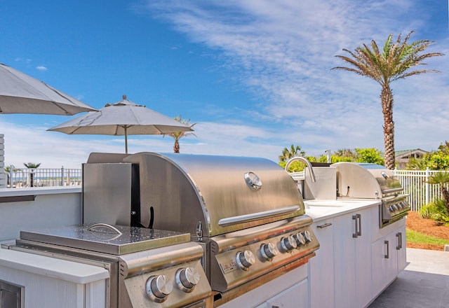 3820 E County Highway 30a Unit 408, Santa Rosa Beach, FL 32459 - view of patio featuring exterior kitchen