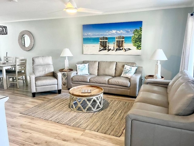 2800 Scenic Gulf Dr Unit 32, Miramar Beach, FL 32550 - living area with crown molding, wood finished floors, and a ceiling fan