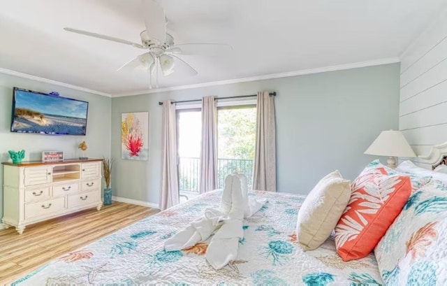 2800 Scenic Gulf Dr Unit 32, Miramar Beach, FL 32550 - bedroom with wood finished floors, ornamental molding, a ceiling fan, and baseboards