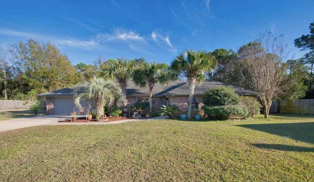 3995 Spanish Moss Cv, Gulf Breeze, FL 32563 - view of front facade featuring concrete driveway and a garage