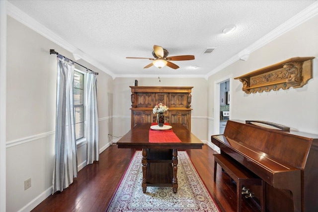 3995 Spanish Moss Cv, Gulf Breeze, FL 32563 - dining area featuring a textured ceiling, ceiling fan, wood finished floors, and crown molding