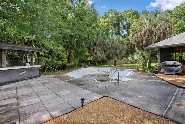 3995 Spanish Moss Cv, Gulf Breeze, FL 32563 - view of swimming pool featuring a patio area and area for grilling