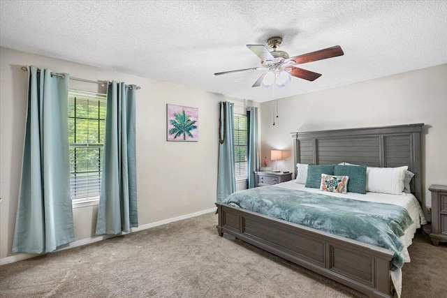 3995 Spanish Moss Cv, Gulf Breeze, FL 32563 - carpeted bedroom featuring a textured ceiling and a ceiling fan