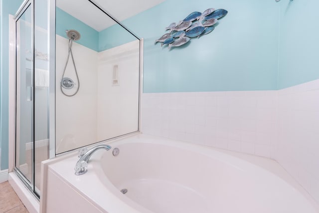 122 Seascape Dr Unit 208, Miramar Beach, FL 32550 - bathroom with a garden tub and a shower stall