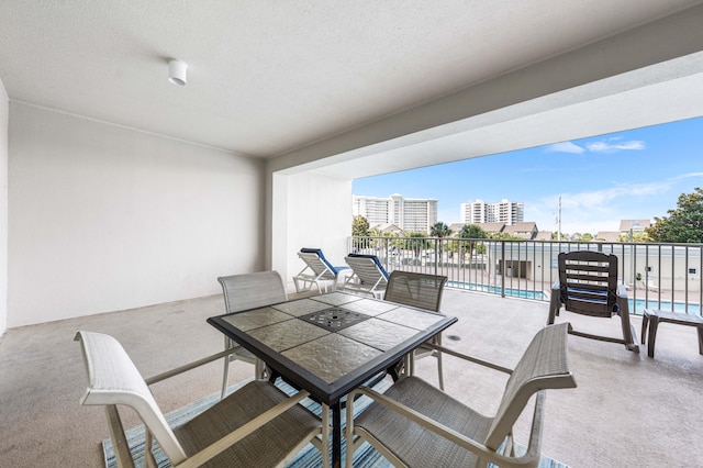 122 Seascape Dr Unit 208, Miramar Beach, FL 32550 - view of patio with outdoor dining area