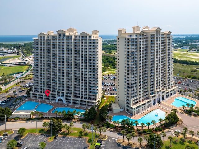 122 Seascape Dr Unit 208, Miramar Beach, FL 32550 - bird's eye view of a pool area, apartment complex, and a large body of water