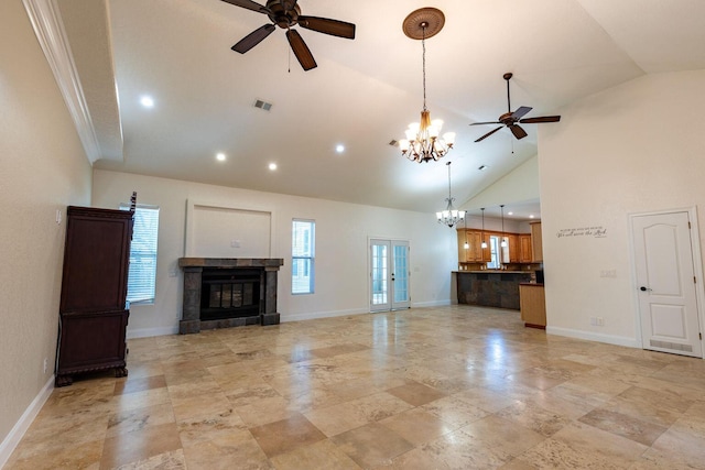 2007 Bayshore Dr, Niceville, FL 32578 - unfurnished living room with ceiling fan, a chandelier, a fireplace, recessed lighting, and high vaulted ceiling